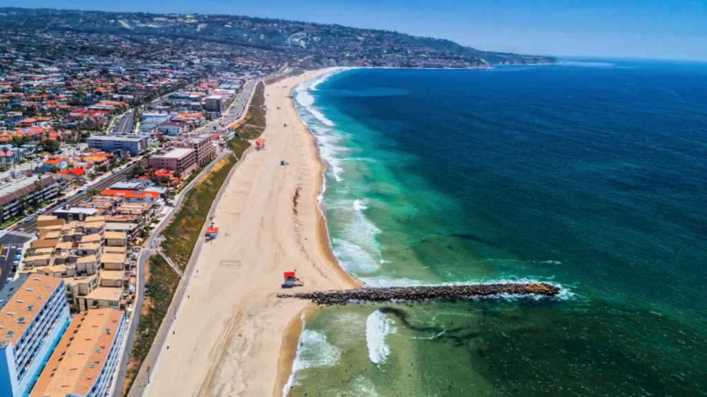 Choosing a Home Near the Beach: Compare Manhattan, Hermosa and Redondo 1 Aerial view of the South Bay coastline for buyers choosing a home near the beach
